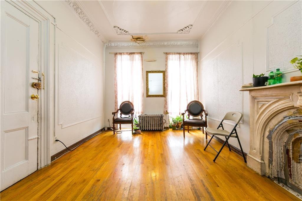 159 9th Street Brooklyn, NY 11215 - Photo 3 of 20 a living room with furniture and a wooden floor