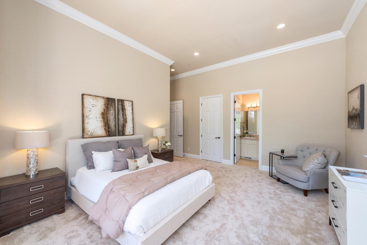 17682 Blanchard Drive Monte Sereno, CA 95030 - Photo 11 of 35 a spacious bedroom with a bed and a couch