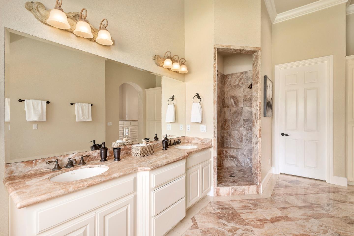 17682 Blanchard Drive Monte Sereno, CA 95030 - Photo 17 of 35 a bathroom with a sink double vanity and a shower