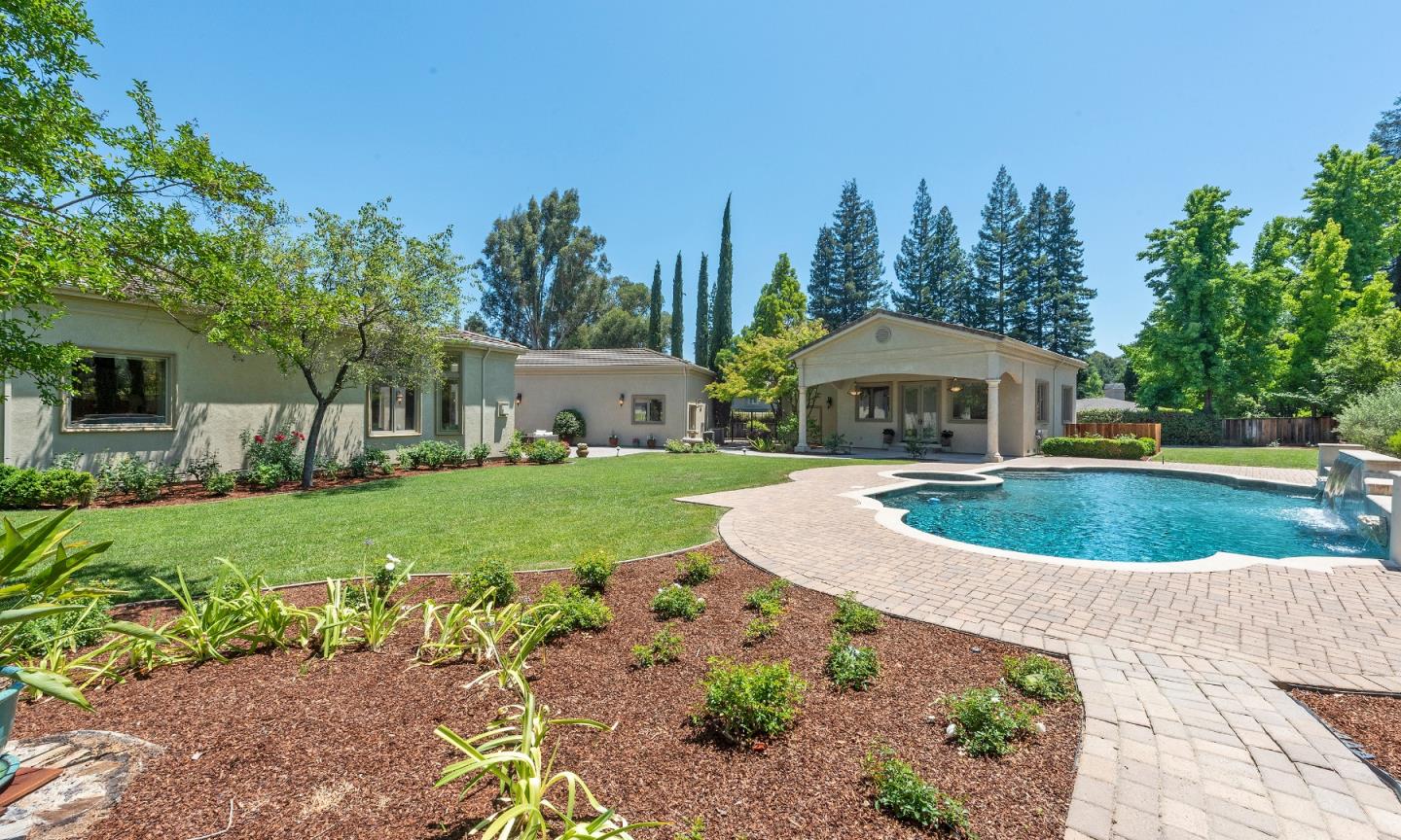 17682 Blanchard Drive Monte Sereno, CA 95030 - Photo 23 of 35 a front view of a house with garden