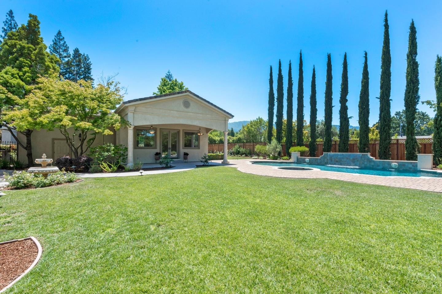 17682 Blanchard Drive Monte Sereno, CA 95030 - Photo 26 of 35 a view of a house with a yard patio and swimming pool