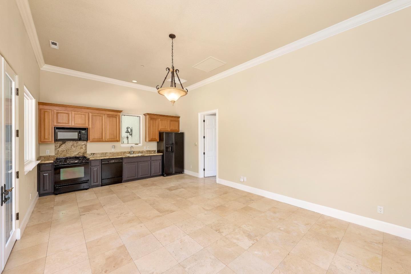 17682 Blanchard Drive Monte Sereno, CA 95030 - Photo 27 of 35 a large kitchen with cabinets and stainless steel appliances