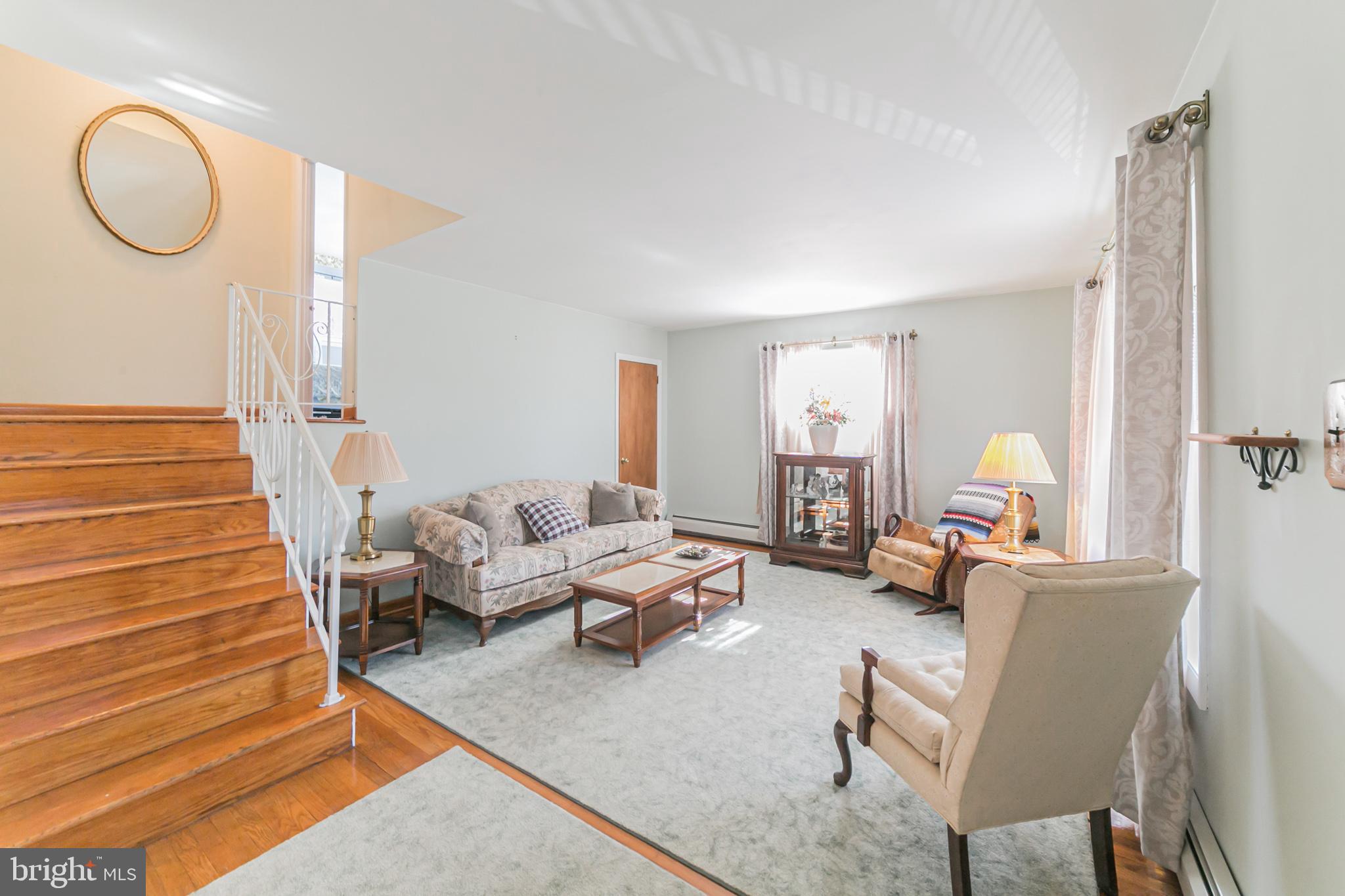 129 Meetinghouse Road Hatboro, PA 19040 - Photo 3 of 30 Living room and steps to 2nd floor