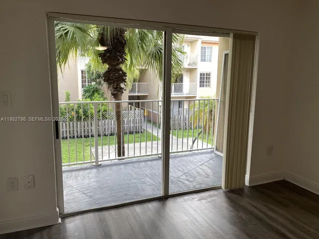 a view of hallway with a large window