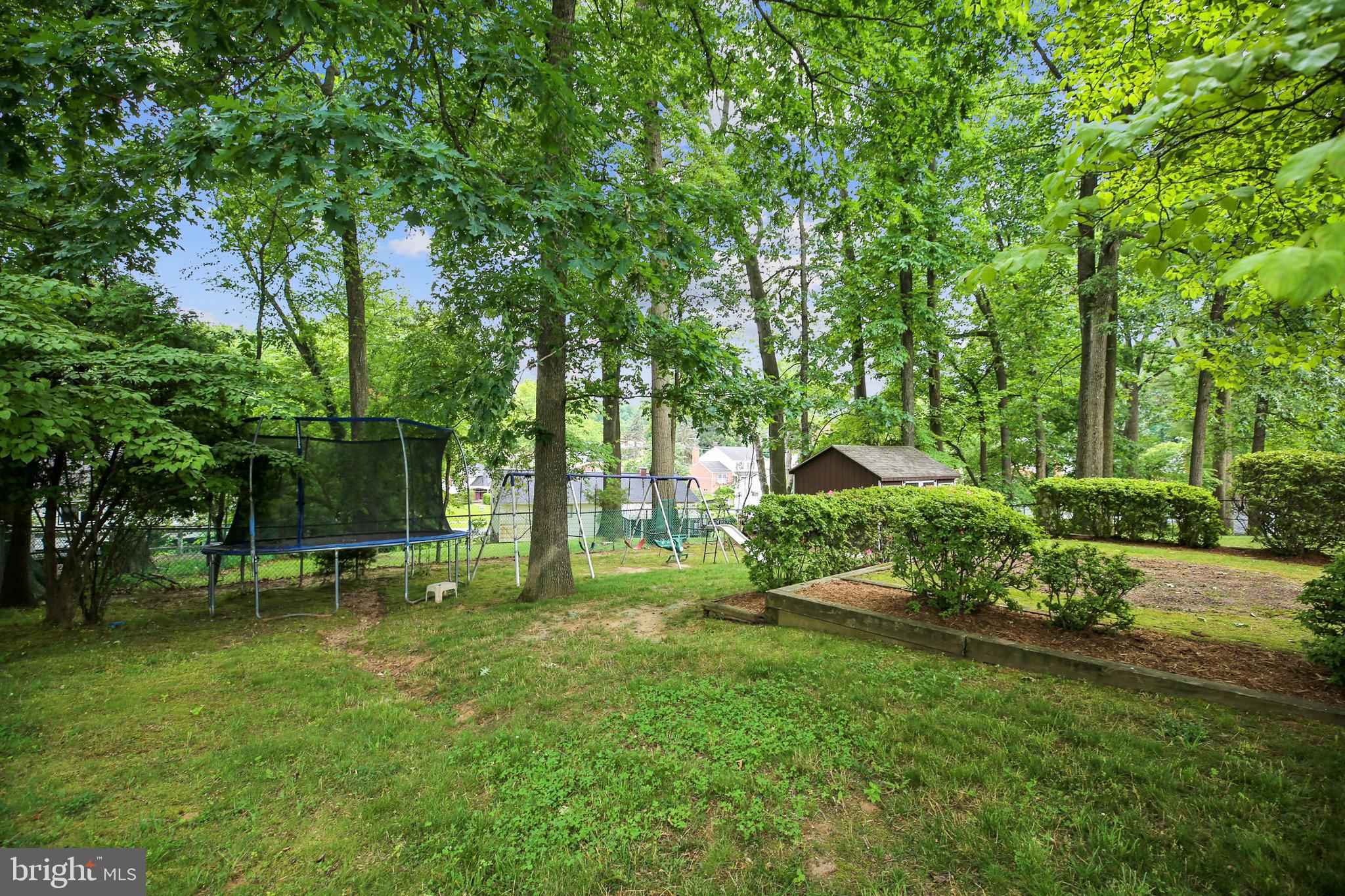 812 Kersey Road Silver Spring, MD 20902 - Photo 29 of 30 Back Elevation & Play Equipment