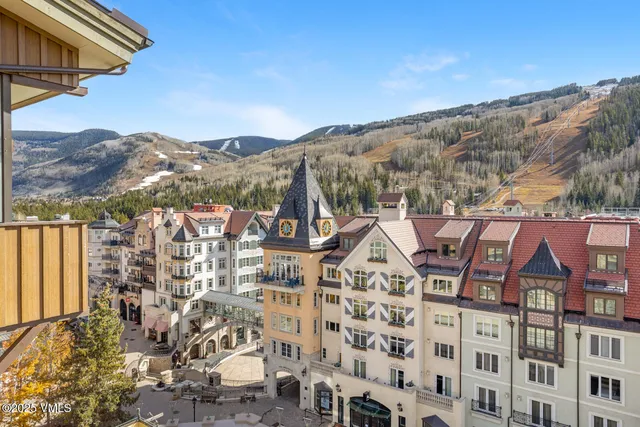 a view of city with ocean