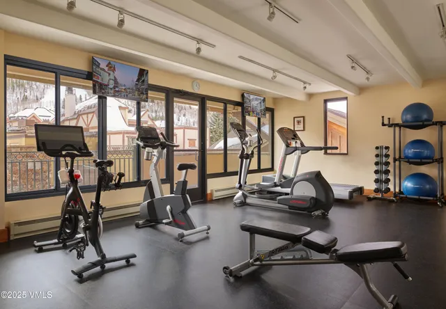 a view of a room with gym equipment