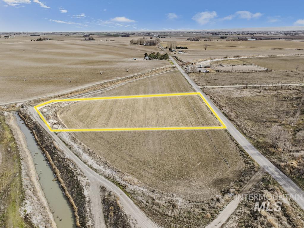 2 300 South Road Paul, ID 83347 - Photo 2 of 12 View of rural area featuring property boundaries highlighted and rows of crops