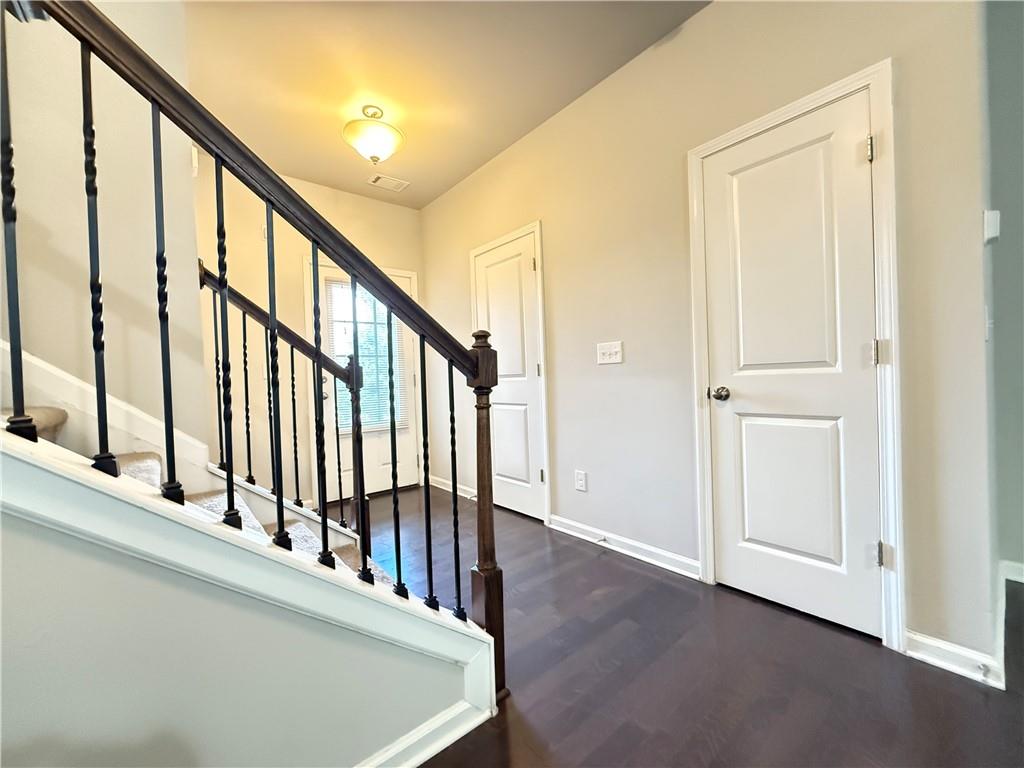 1739 Charcoal Ives Road Lawrenceville, GA 30045 - Photo 5 of 37 a view of an entryway with wooden floor