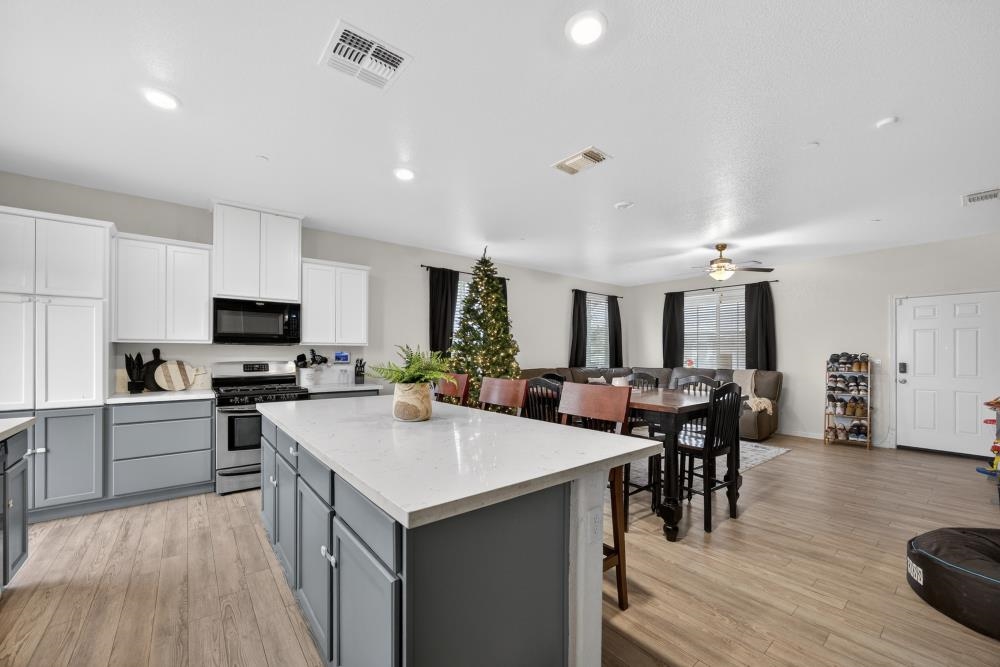 1958 Freedom Way Rio Vista, CA 94571 - Photo 44 of 44 a view of kitchen with cabinets table and chairs