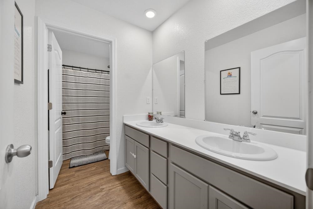 1958 Freedom Way Rio Vista, CA 94571 - Photo 19 of 44 a bathroom with a sink and a mirror