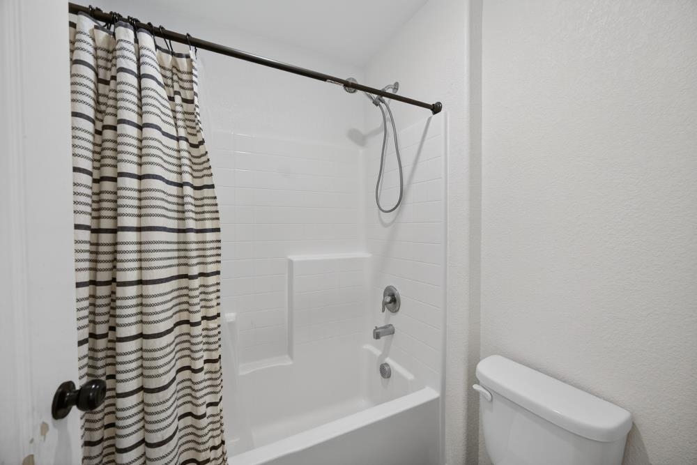 1958 Freedom Way Rio Vista, CA 94571 - Photo 20 of 44 a bathroom with a bathtub and shower