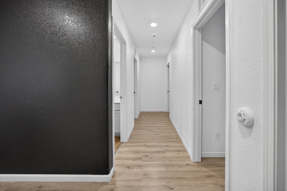 1958 Freedom Way Rio Vista, CA 94571 - Photo 21 of 44 a view of a hallway with wooden floor