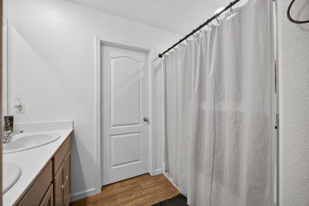 1958 Freedom Way Rio Vista, CA 94571 - Photo 29 of 44 a view of a bathroom with a sink and a mirror