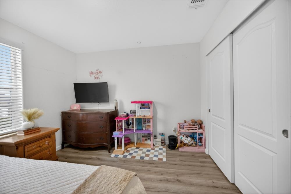 1958 Freedom Way Rio Vista, CA 94571 - Photo 35 of 44 a living room with furniture and a flat screen tv