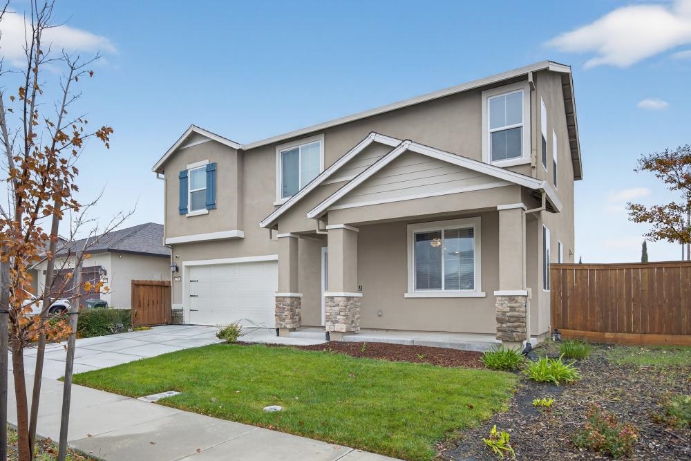 1958 Freedom Way Rio Vista, CA 94571 - Photo 4 of 44 a front view of a house with a yard