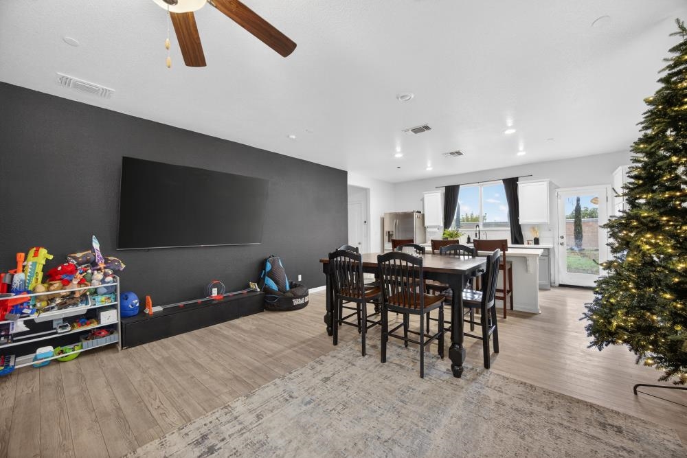 1958 Freedom Way Rio Vista, CA 94571 - Photo 7 of 44 a view of a dining room with furniture and wooden floor