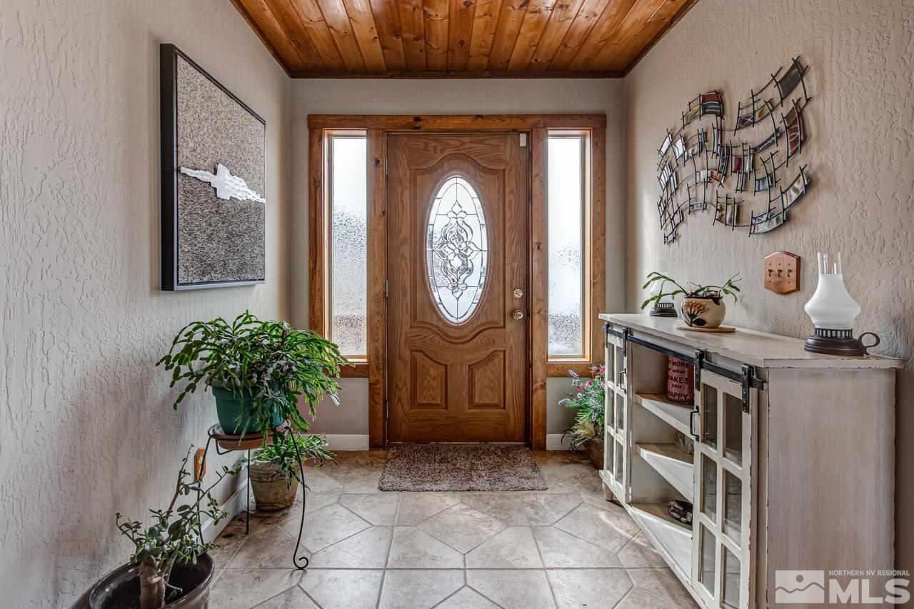 2170 Soda Lake Road Fallon, NV 89406 - Photo 3 of 25 a view of a hallway with wooden floor