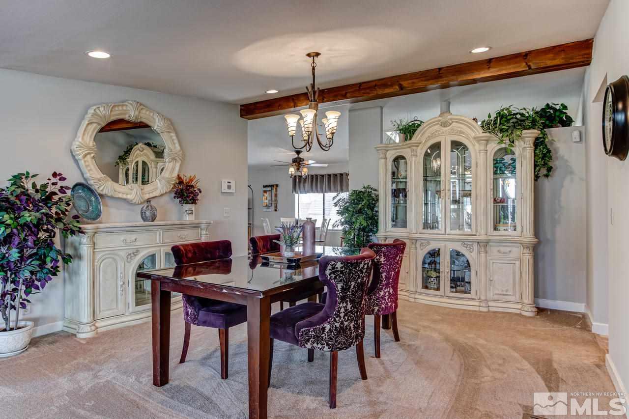 2170 Soda Lake Road Fallon, NV 89406 - Photo 7 of 25 a view of a dining room with furniture and a chandelier