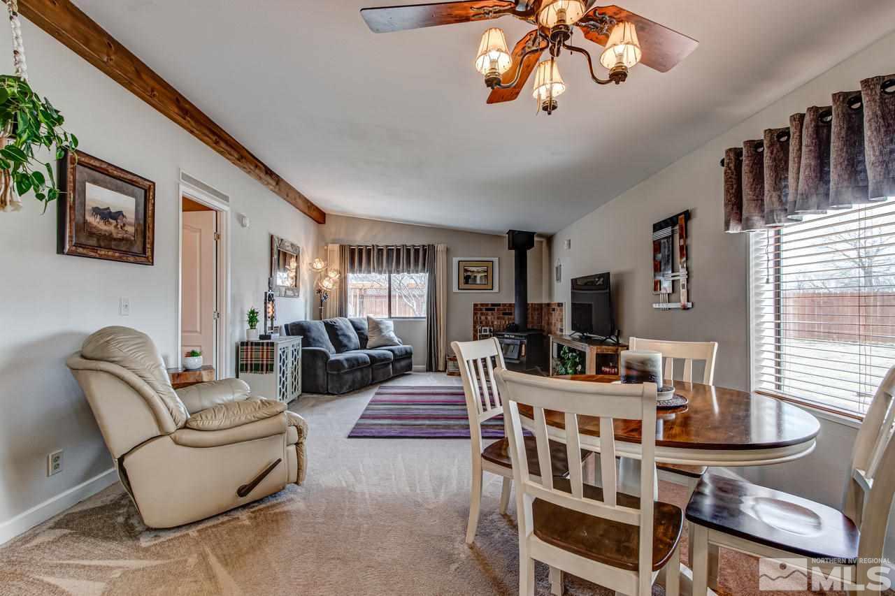 2170 Soda Lake Road Fallon, NV 89406 - Photo 8 of 25 a living room with furniture a flat screen tv and a window