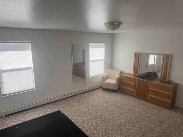 an empty room with windows