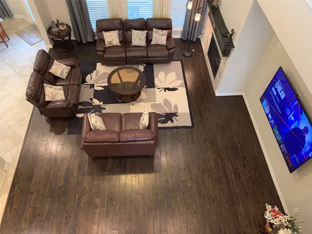 an entryway with wooden floor