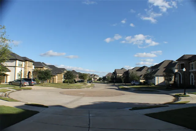 a view of street with houses