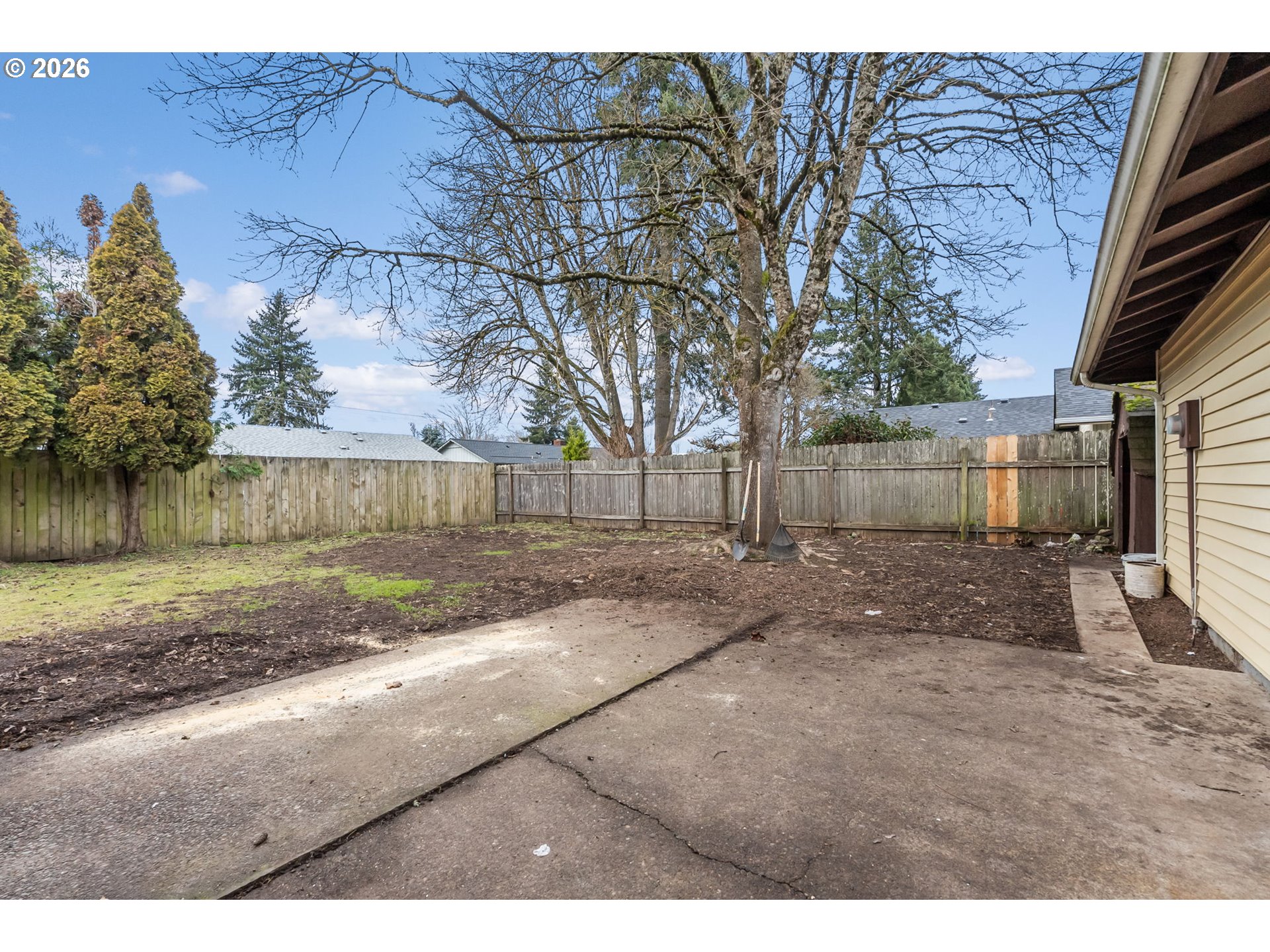 446 Kodiak Street Eugene, OR 97401 - Photo 27 of 34 a view of a backyard with large trees