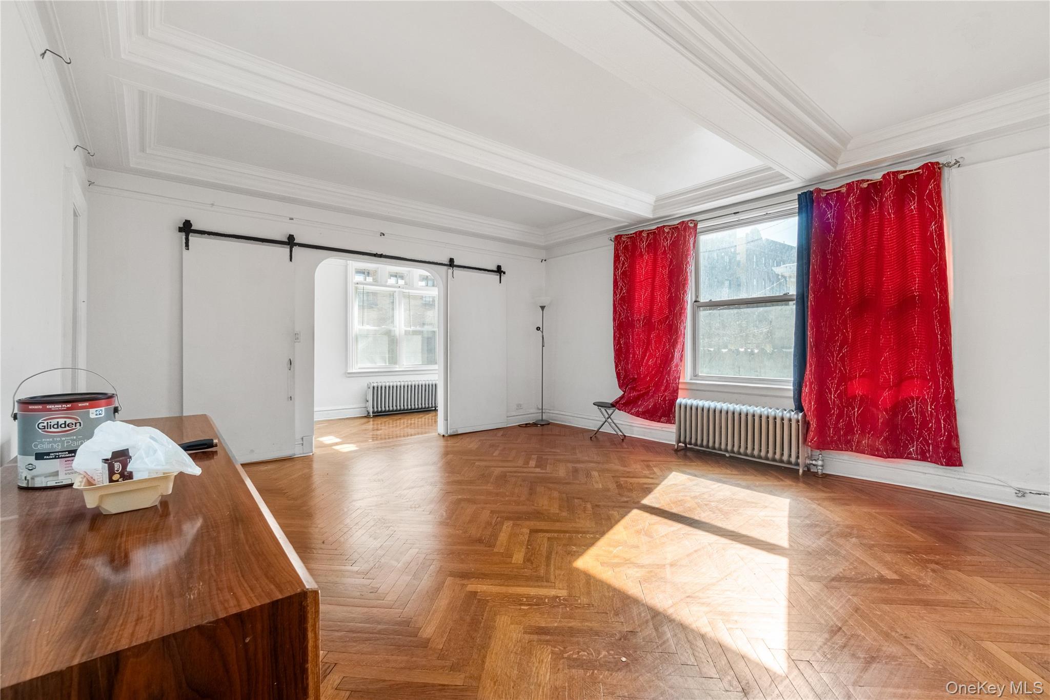 2969 Perry Avenue Bronx, NY 10458 - Photo 25 of 36 a view of a livingroom with wooden floor and furniture