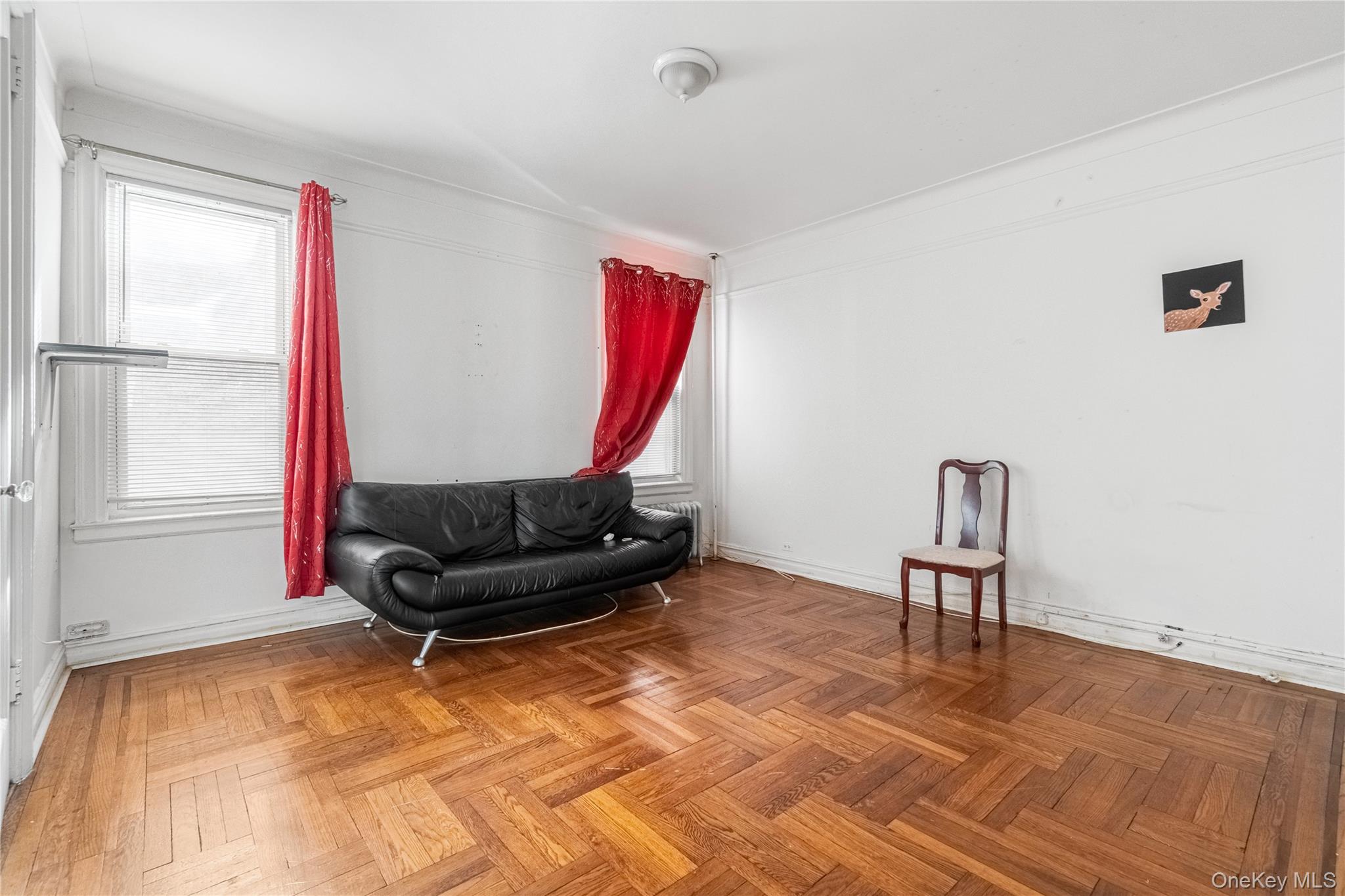 2969 Perry Avenue Bronx, NY 10458 - Photo 26 of 36 a living room with furniture