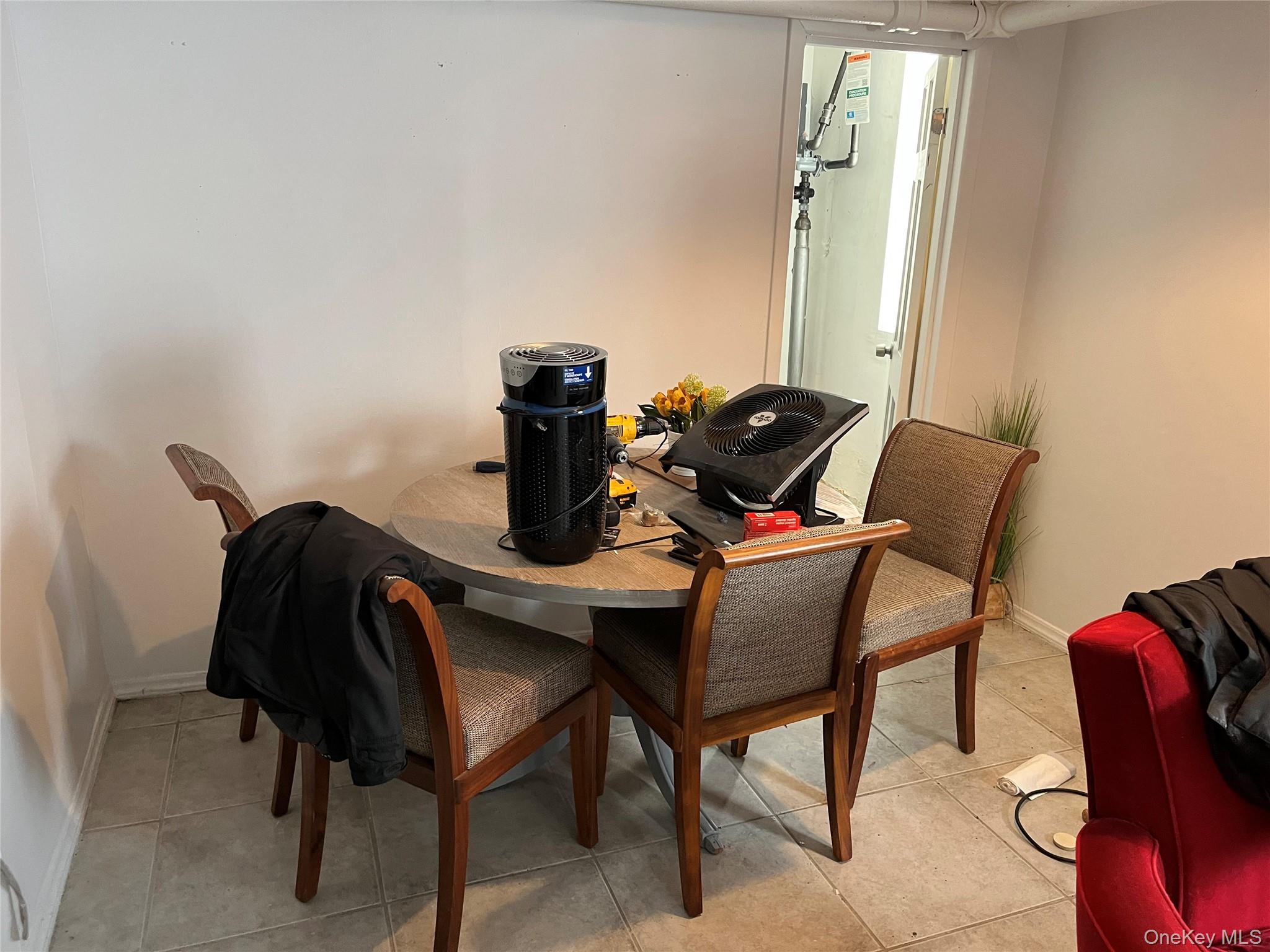 2969 Perry Avenue Bronx, NY 10458 - Photo 35 of 36 a view of a workspace with furniture