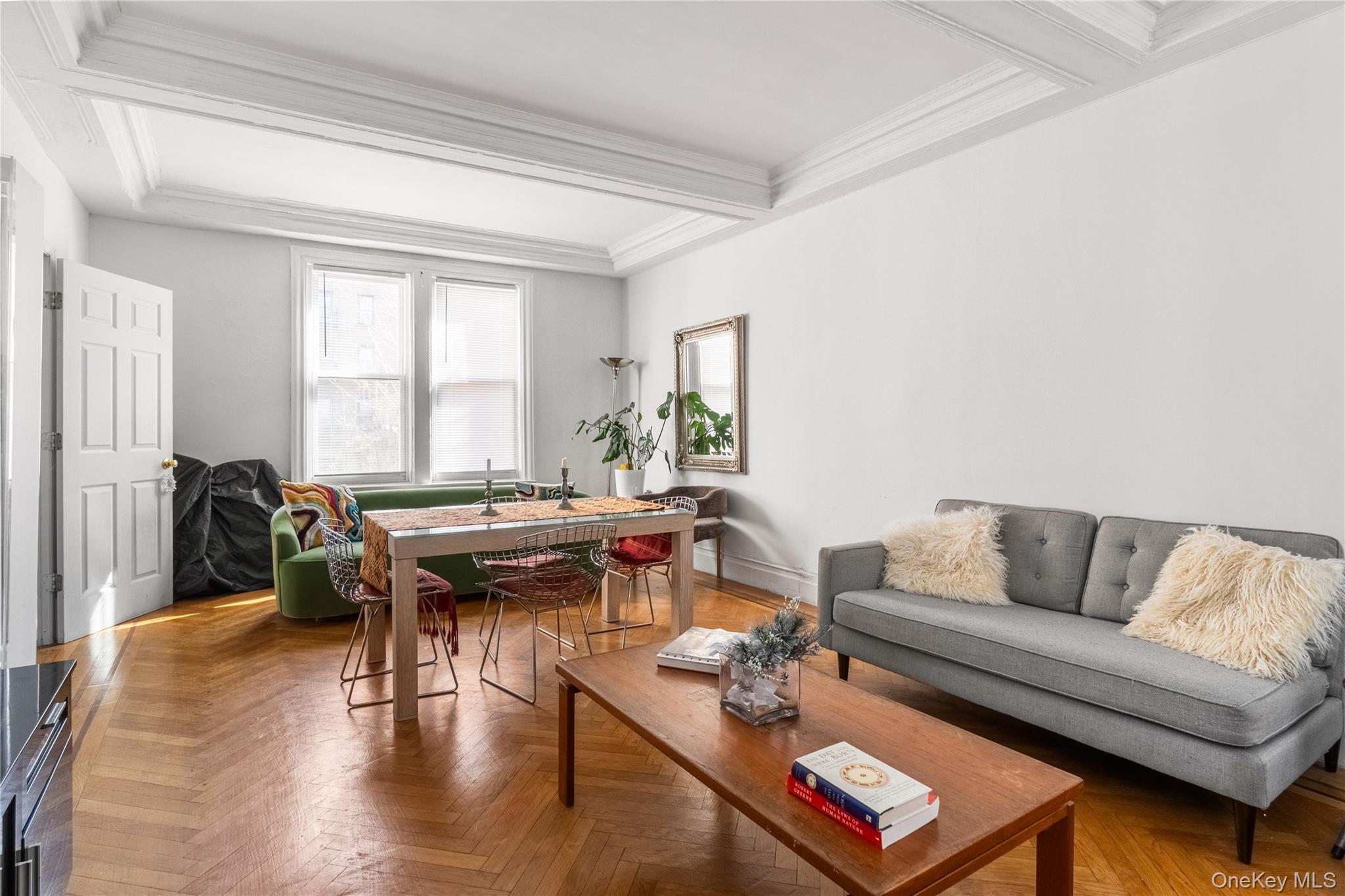 2969 Perry Avenue Bronx, NY 10458 - Photo 5 of 36 a living room with furniture a rug and a window