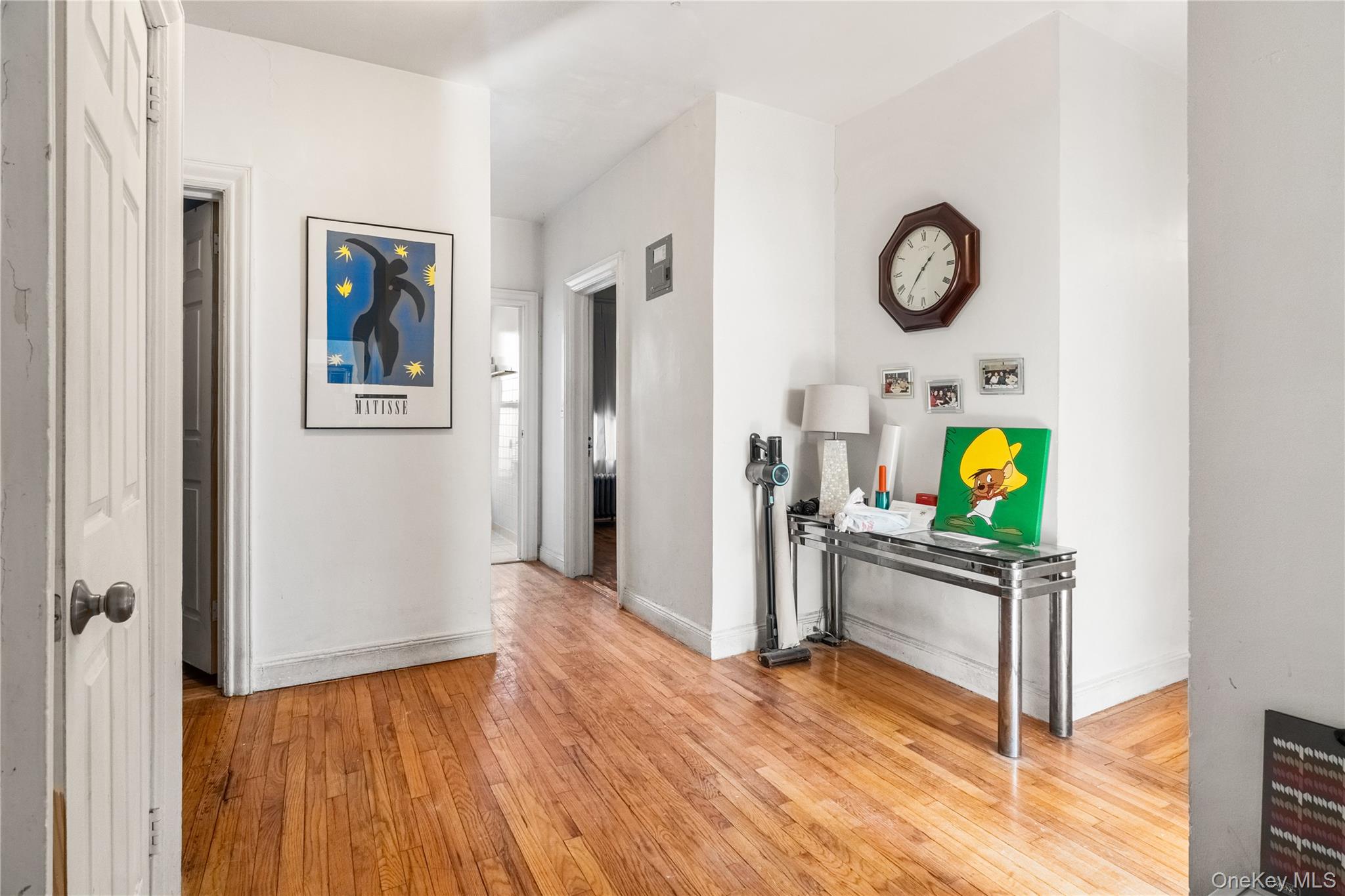 2969 Perry Avenue Bronx, NY 10458 - Photo 8 of 36 a view of a living room and wooden floor