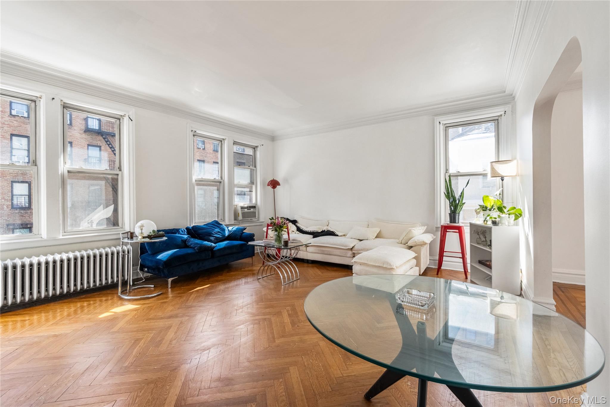 2969 Perry Avenue Bronx, NY 10458 - Photo 9 of 36 a living room with furniture and wooden floor
