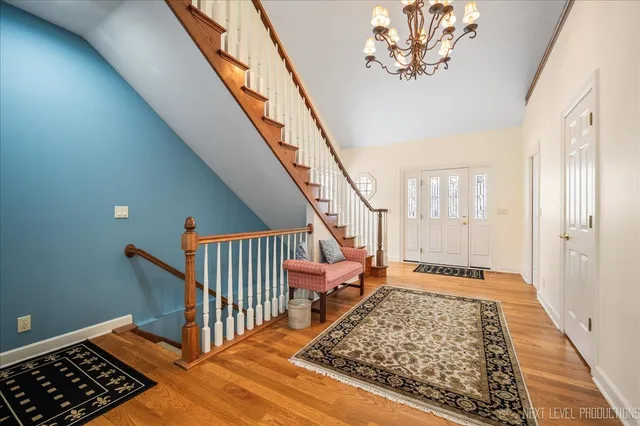 a view of entryway with wooden floor