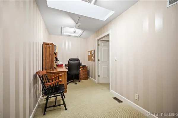 a view of a livingroom with furniture and a livingroom