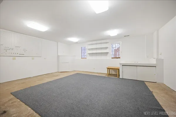 an empty room with closet area