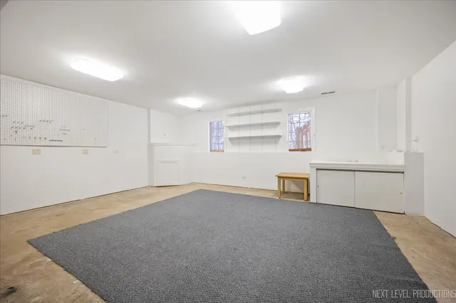 an empty room with closet area