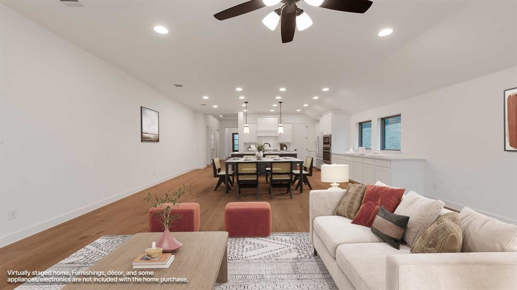 829 Stoney Bridge Way Lavon, TX 75166 - Photo 2 of 35 a living room with furniture and kitchen view