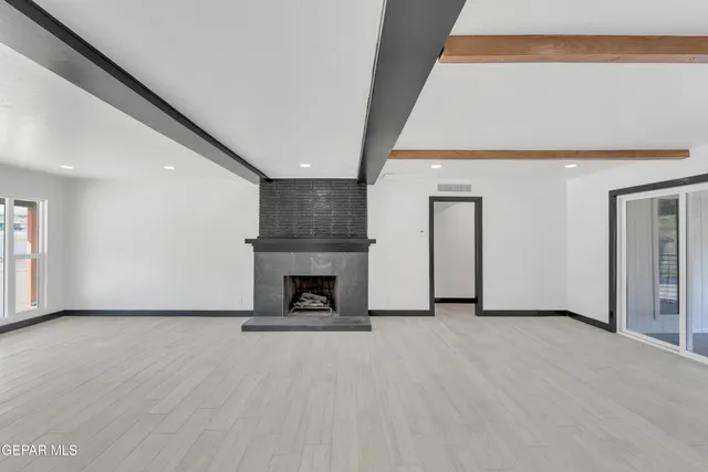 a view of a livingroom with a fireplace