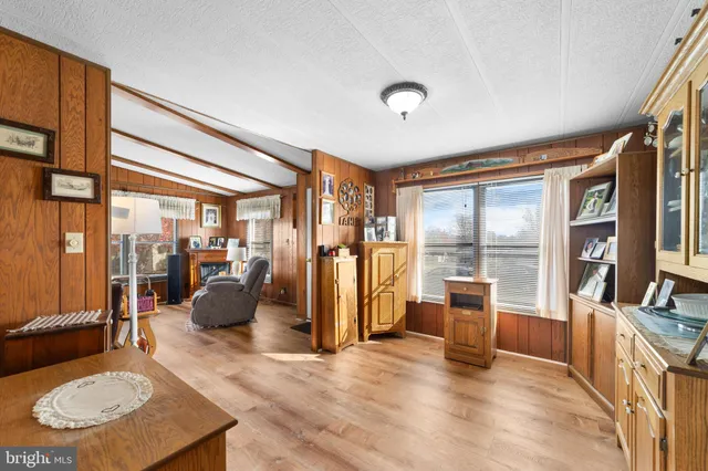 a view of a living room and dining room