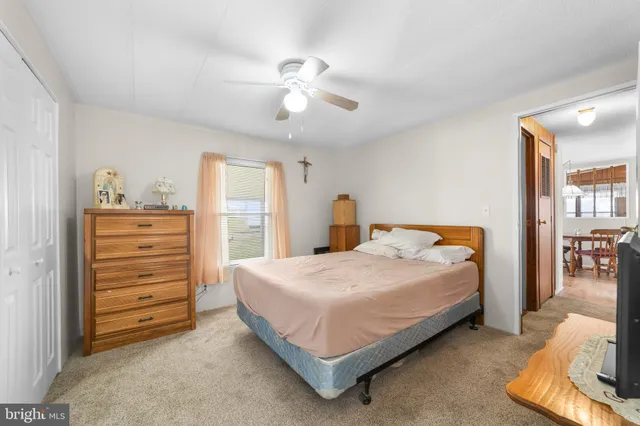 a bedroom with a bed and a cabinets