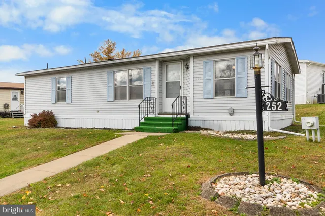 a view of a backyard of the house