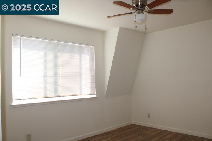 4811 Appian Way, Unit 3/5 El Sobrante, CA 94803 - Photo 16 of 27 an empty room with a window