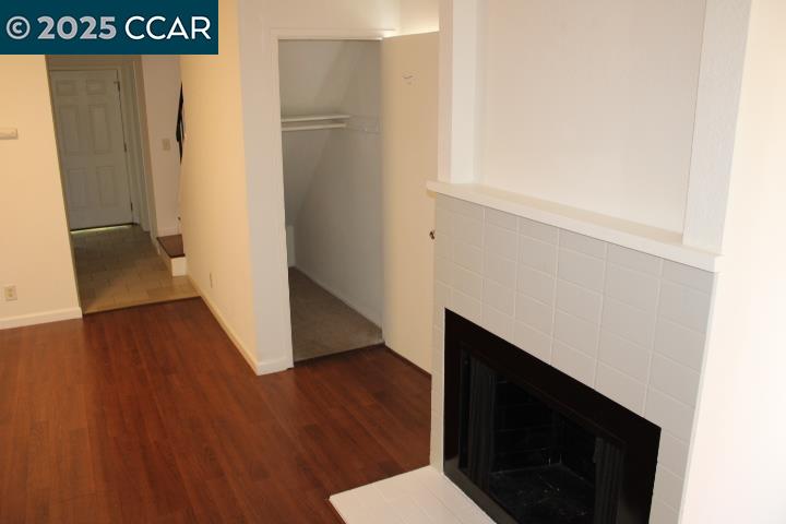 4811 Appian Way, Unit 3/5 El Sobrante, CA 94803 - Photo 5 of 27 a view of hallway with wooden floor and stairs
