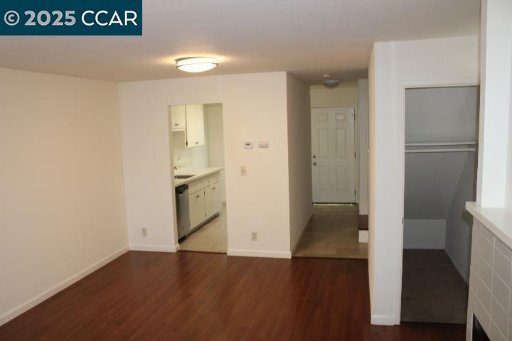 4811 Appian Way, Unit 3/5 El Sobrante, CA 94803 - Photo 6 of 27 a view of hallway with wooden floor