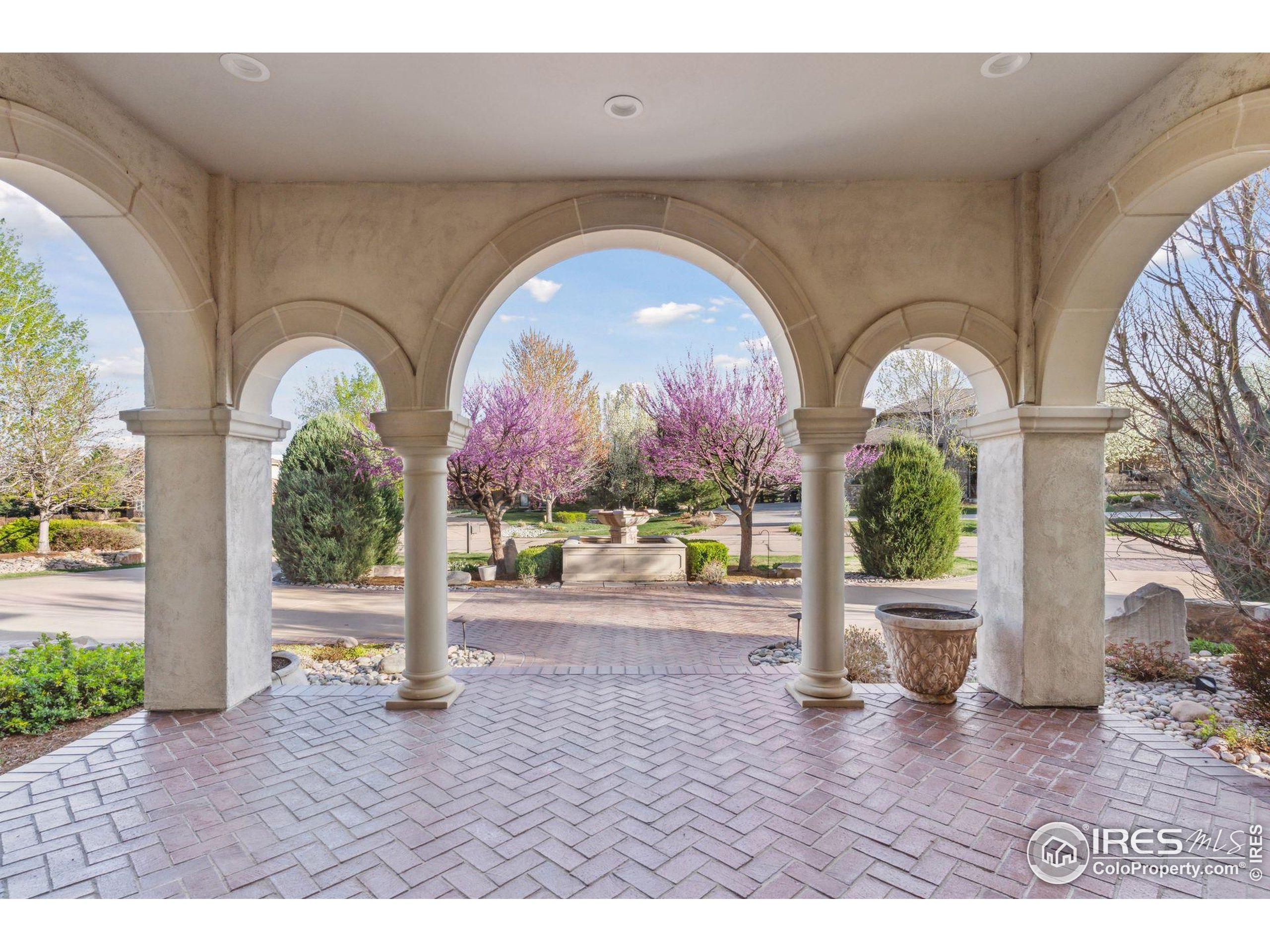 6541 Legend Ridge Trail Niwot, CO 80503 - Photo 11 of 45 a front view of a house with garden