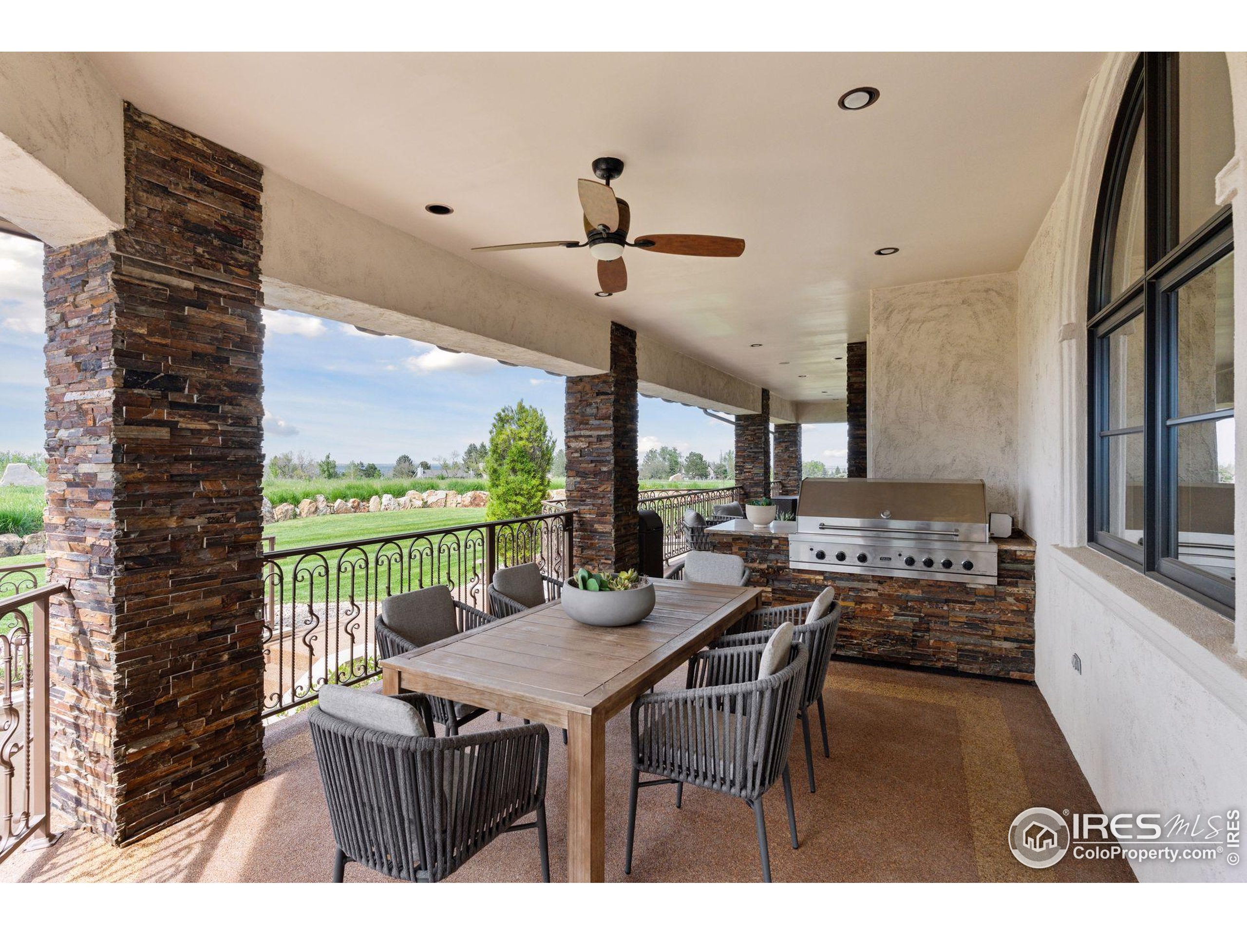 6541 Legend Ridge Trail Niwot, CO 80503 - Photo 23 of 45 a view of a dining room with furniture window and outside view