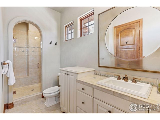 a kitchen with stainless steel appliances kitchen island a stove and a microwave