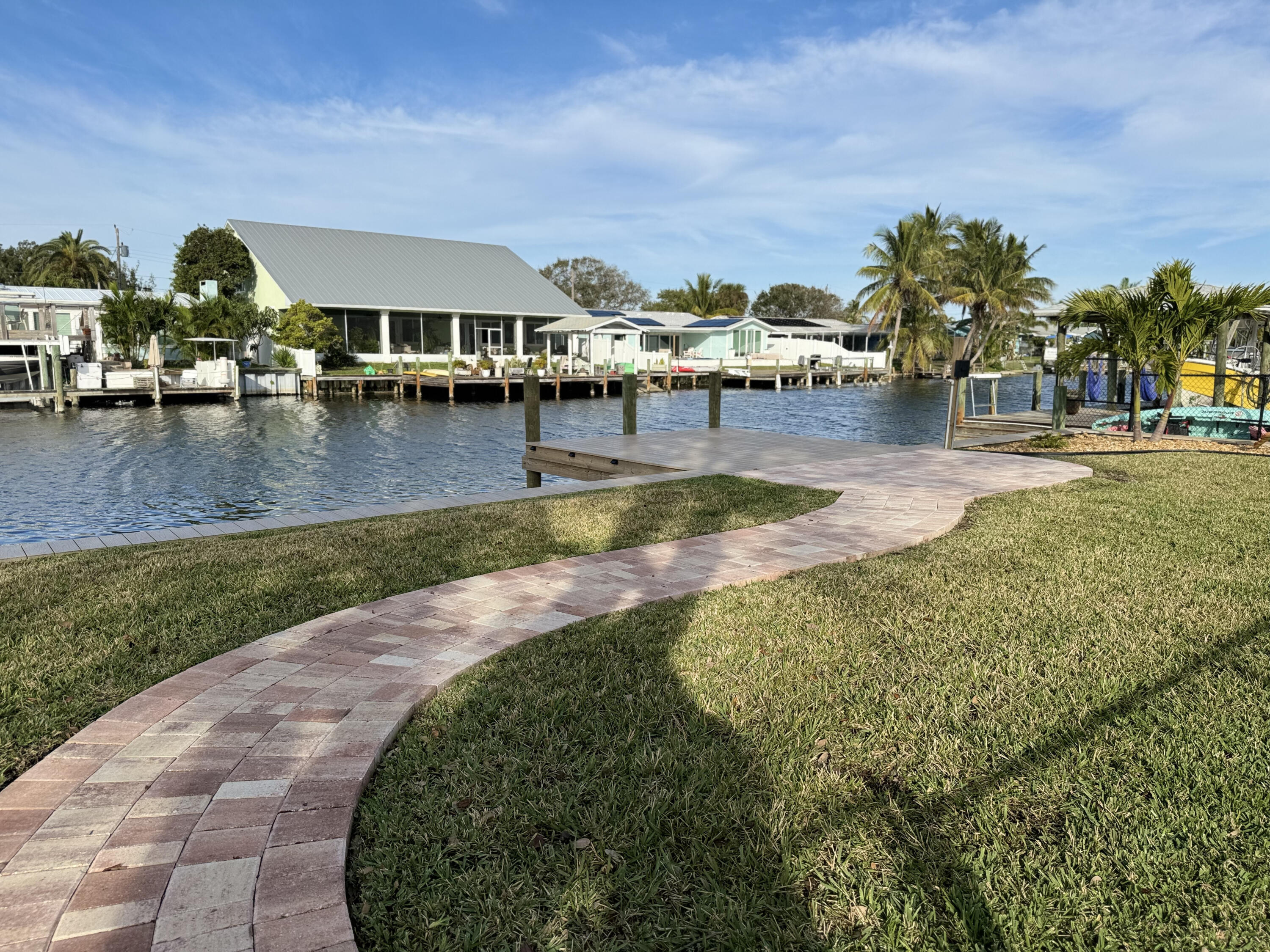 126 Deleon Road Cocoa Beach, FL 32931 - Photo 14 of 26 Back sidewalk 1